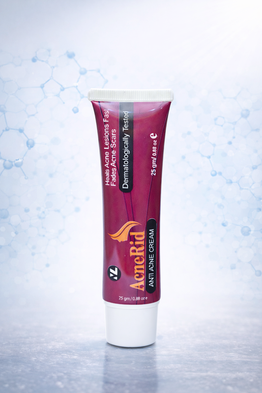 Acne Rid anti-acne cream tube on a light blue background