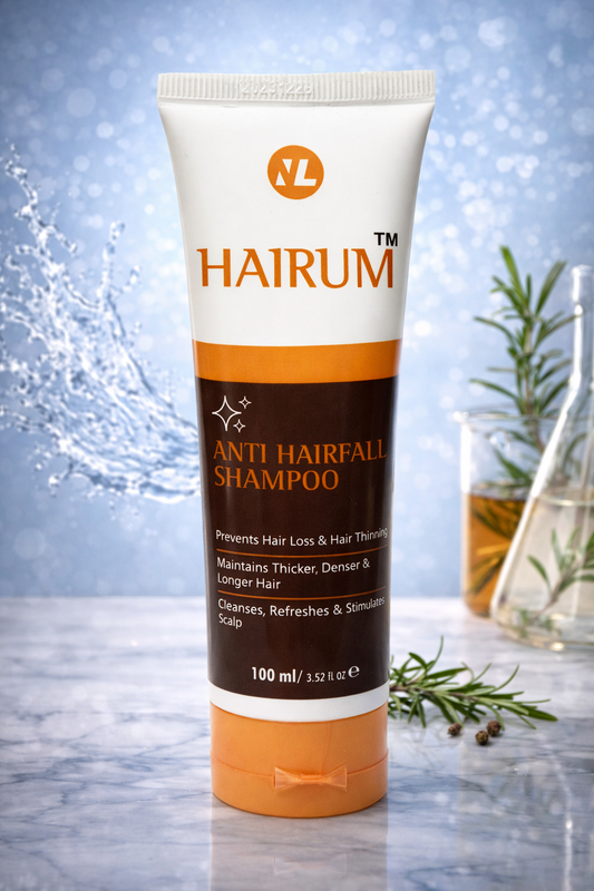 Tube of Hairum anti hairfall shampoo with a blurred background