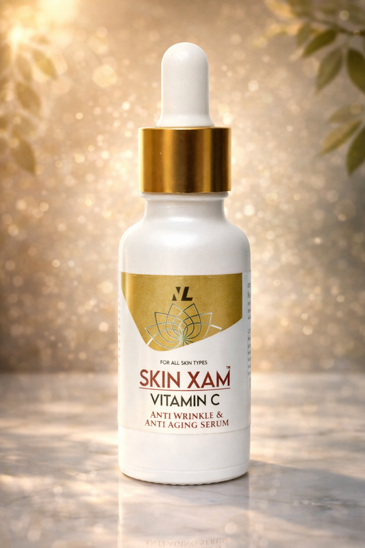 Skin Xam Vitamin C serum bottle with dropper on a blurred natural background